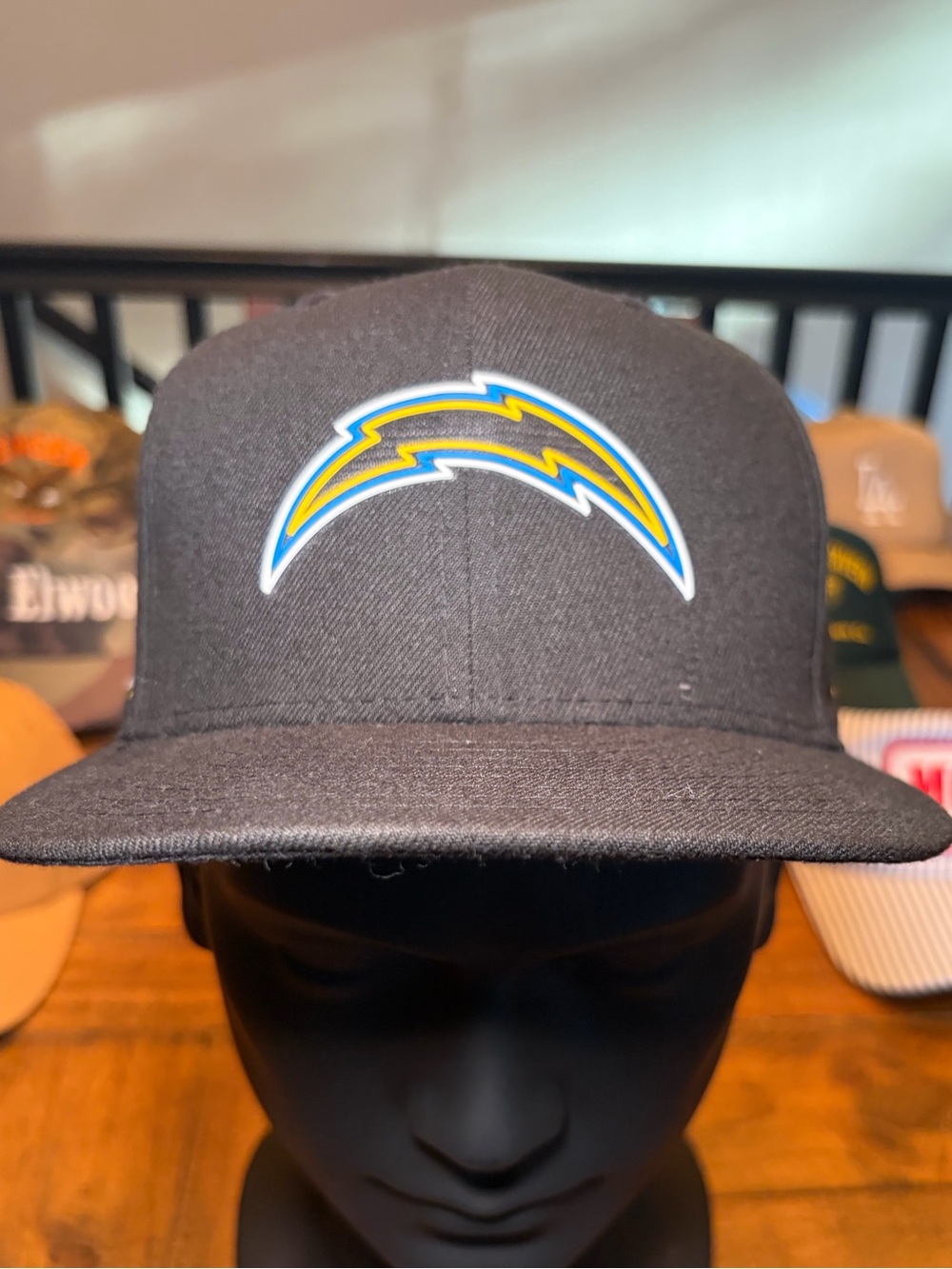 New Era Black Snapback Hat with Yellow & Blue Lightning Logo